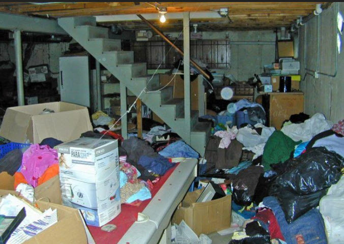 A cluttered basement that needs a cleanout.